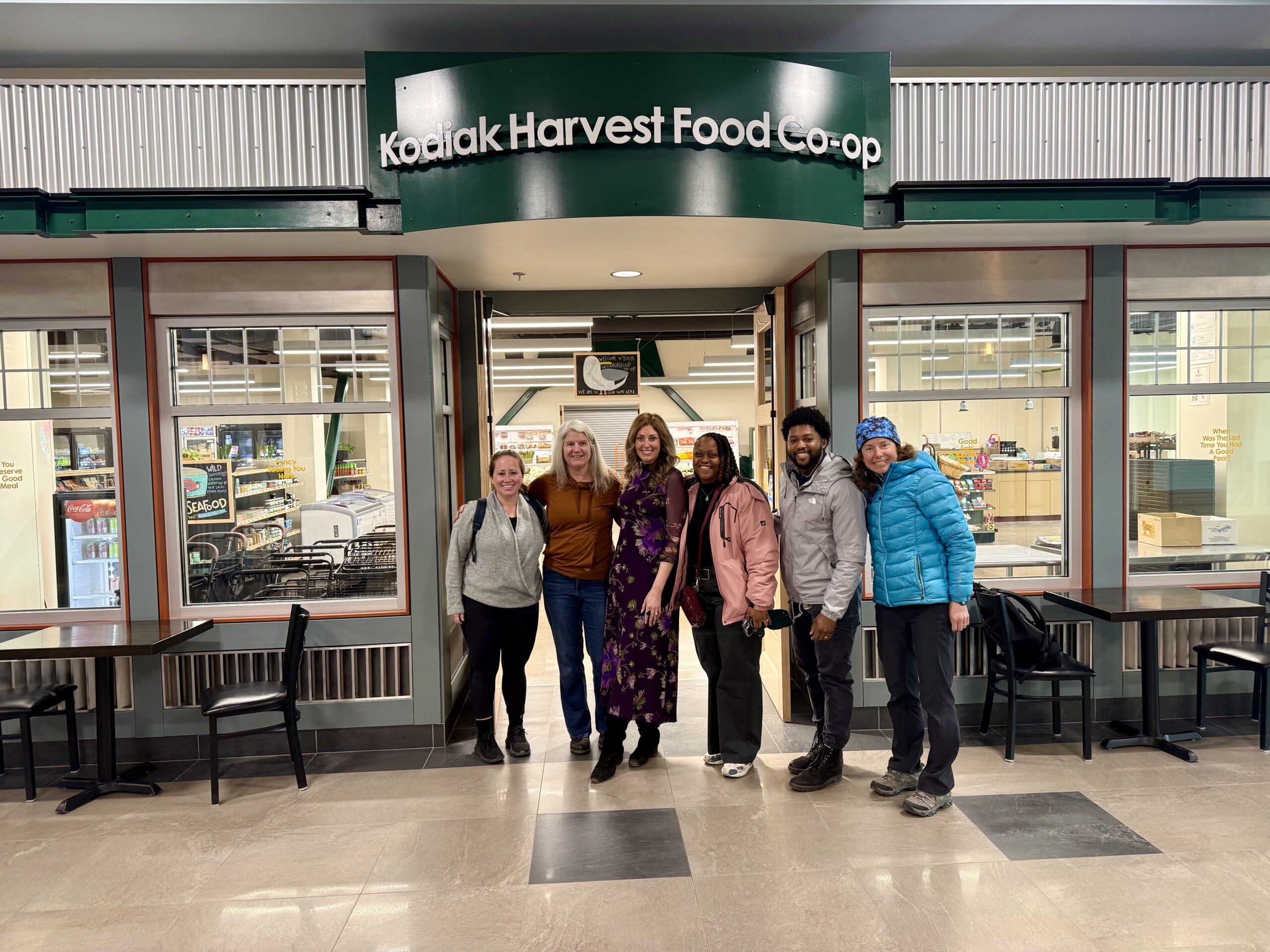 C180 and community partners celebrating the new food co-op adjacent to the boat harbor.