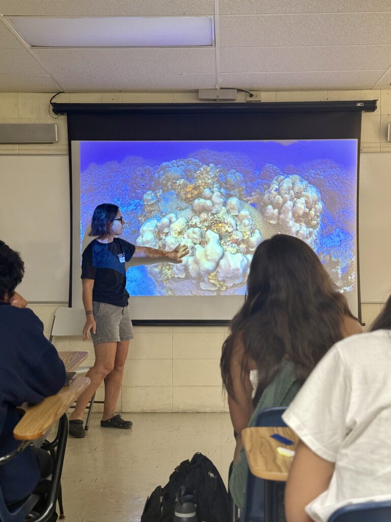Co-Founder and Scientific Director, Stacey Williams, giving a lecture to a cohort of rising first-year college students