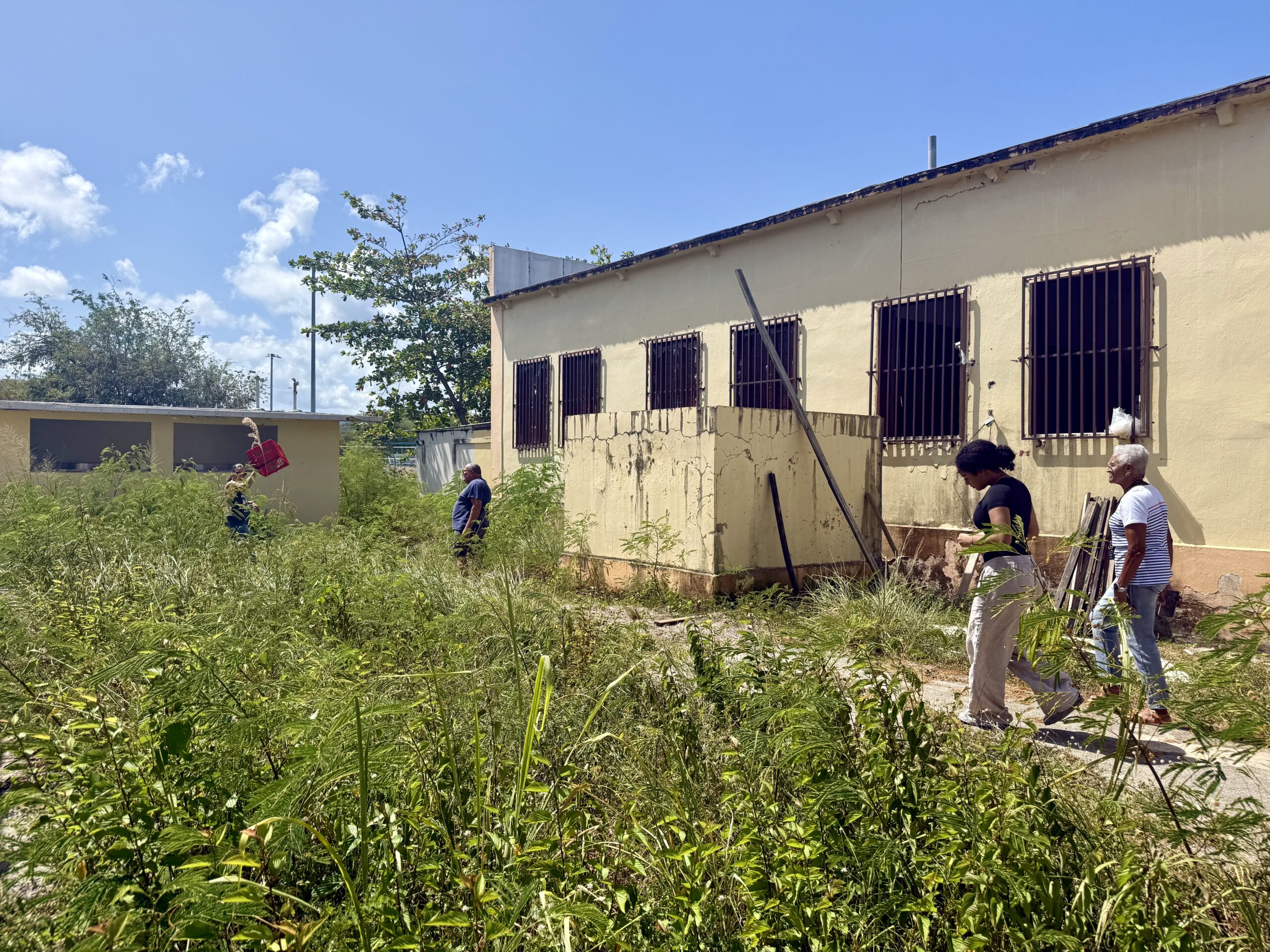 Local residents showing the former school and detailing future planning
